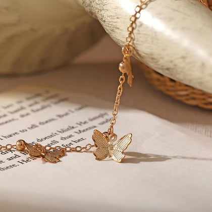 A Stylish Bracelet For Women With An Elegant And Graceful Golden And Silvery Butterfly Pendant, Suitable For Daily Wear By Women And As A Gift For Friends.