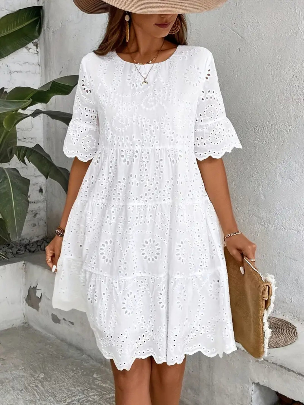 Embroidered Dress with a Hollowed-Out Lining in a Pure Color