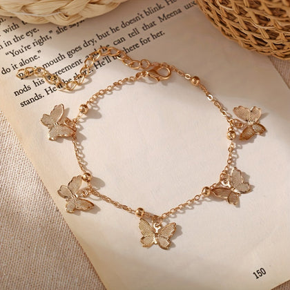 A Stylish Bracelet For Women With An Elegant And Graceful Golden And Silvery Butterfly Pendant, Suitable For Daily Wear By Women And As A Gift For Friends.