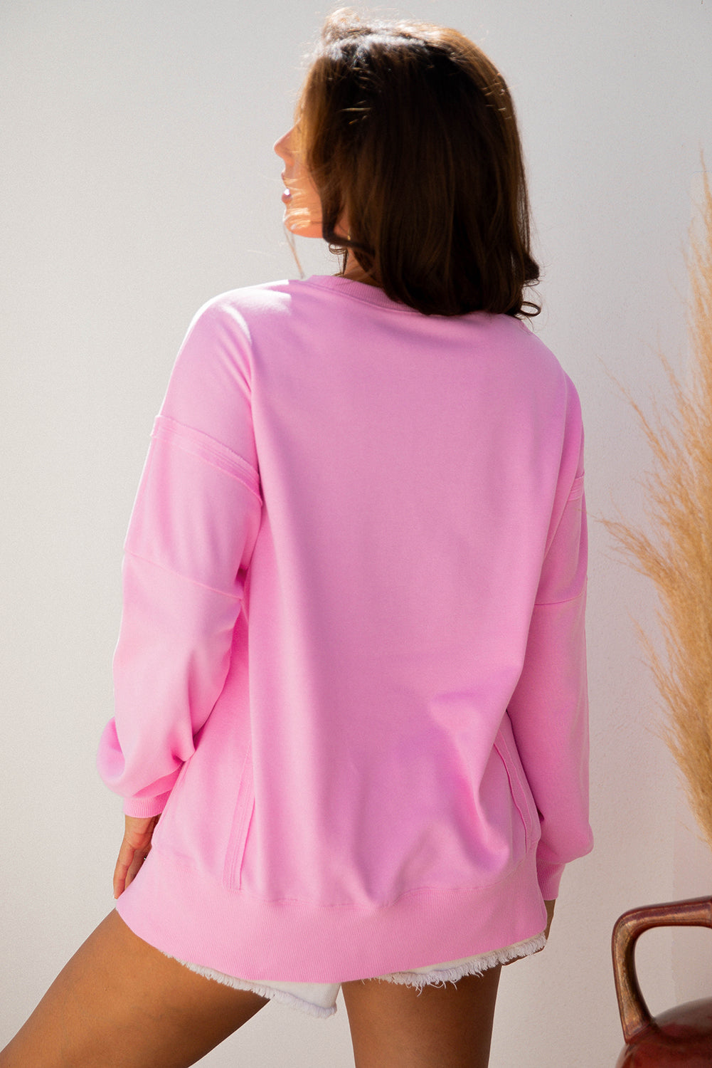 Pink Bow Sequin XOXO Letter Graphic Exposed Seam Baggy Sweatshirt