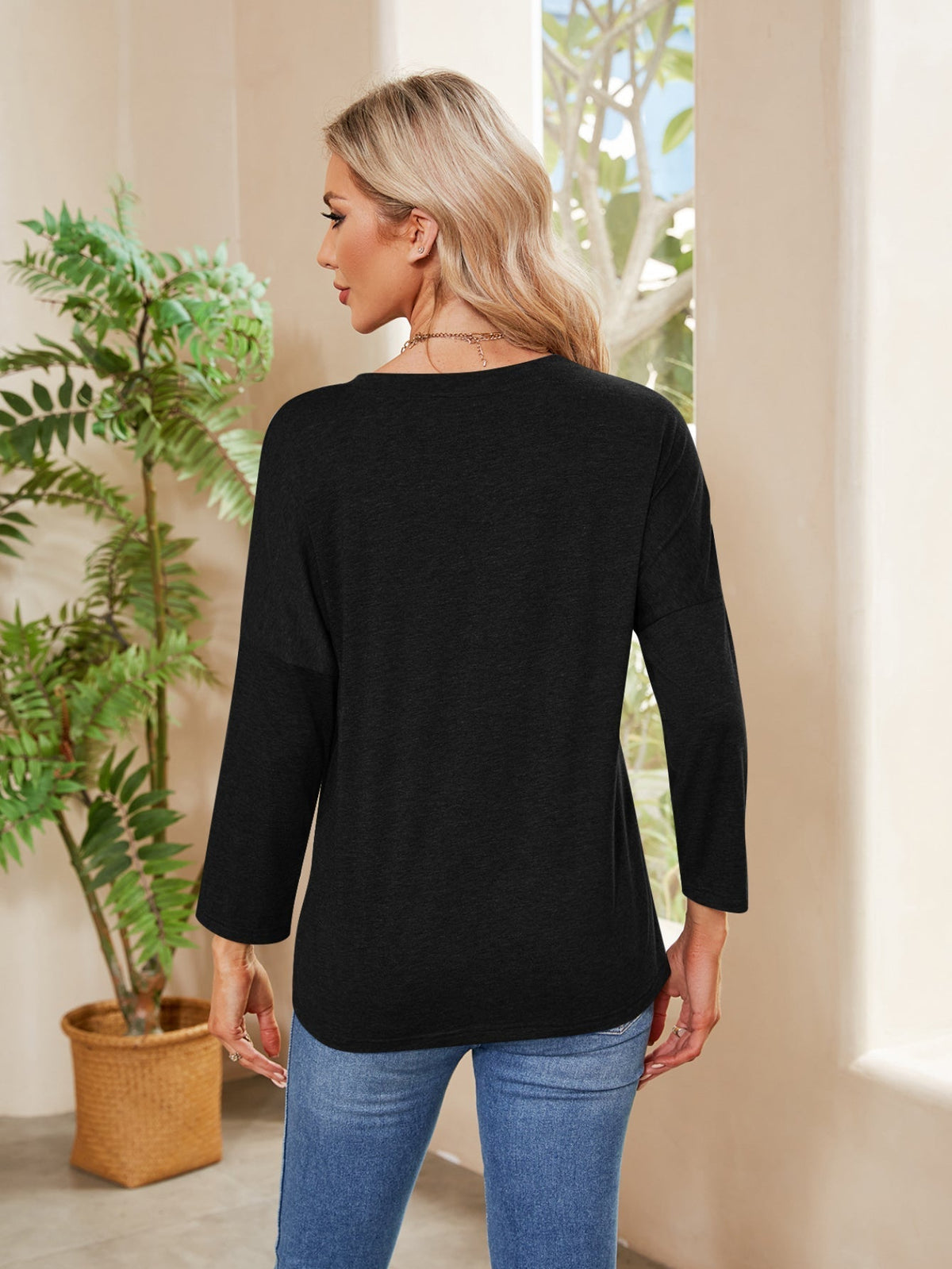 Solid color casual seven-quarter sleeve round neck loose T-shirt