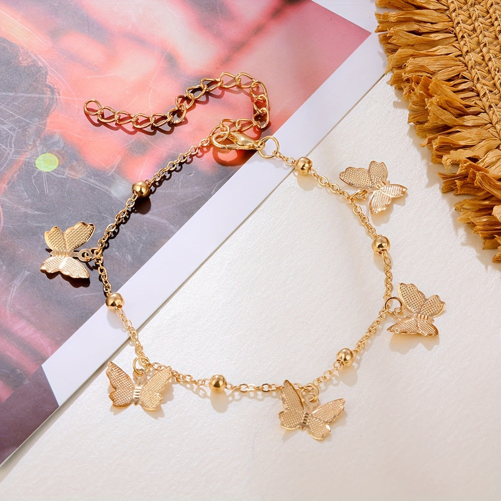 A Stylish Bracelet For Women With An Elegant And Graceful Golden And Silvery Butterfly Pendant, Suitable For Daily Wear By Women And As A Gift For Friends.